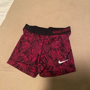 Dark pink snake Nike pros